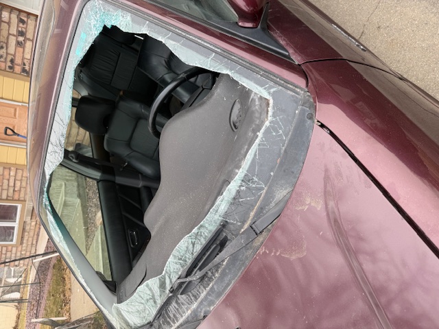 A broken and shattered windshield